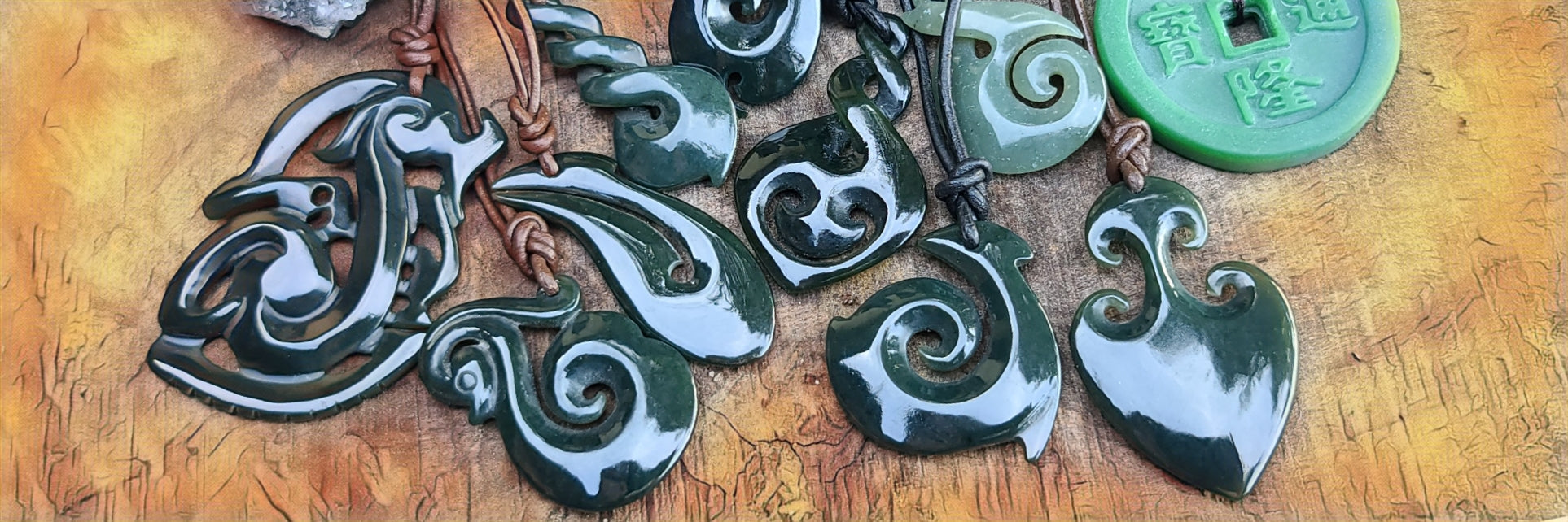 A group of Maori style Jade pendants all hand carved handmade and elegant