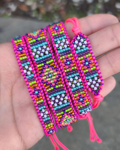 Beaded neon pink rainbow bracelet set by Tiffany Creek