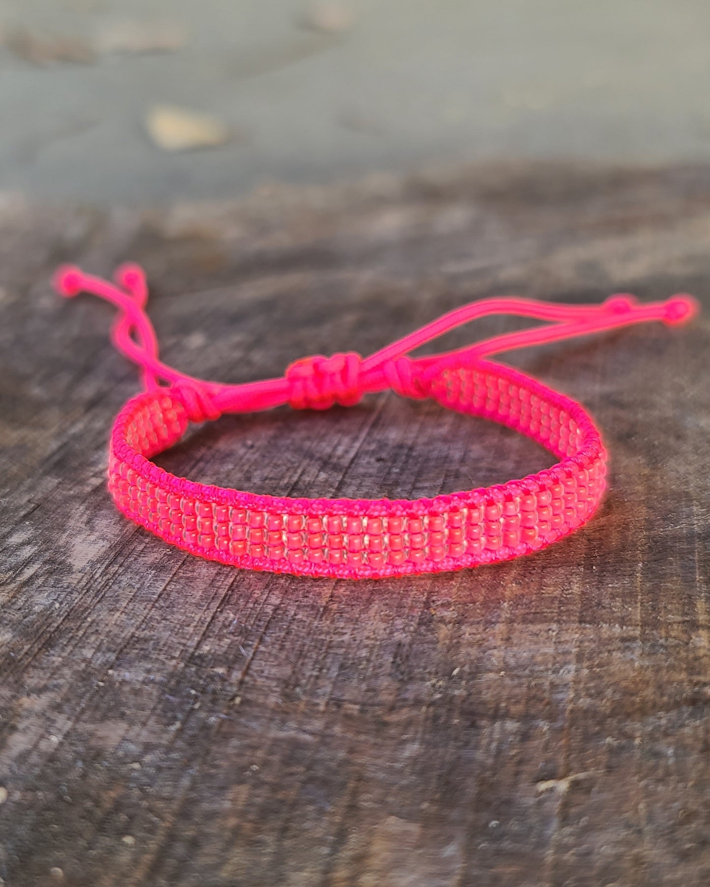 beaded neon hot pink bracelet UV reactive black light Calitrendz by Tiffany Creek