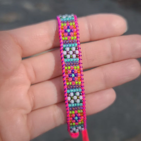 Beaded neon pink rainbow bracelet UV reactive Calitrendz by Tiffany Creek