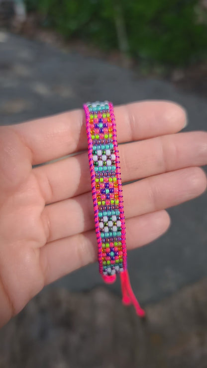 Beaded neon pink rainbow bracelet UV reactive Calitrendz by Tiffany Creek