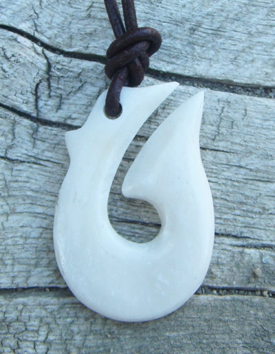 HAND CARVED NATURAL BONE MANAIA WITH HOOK PENDANT. BONE HOOK NECKLACE. – NZ  Pacific